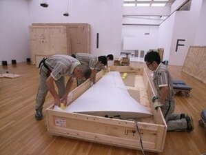 Observing the dismantling and packing of artworks